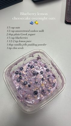 blueberry lemon cheesecake overnight oatmeal recipe in a plastic container on a table