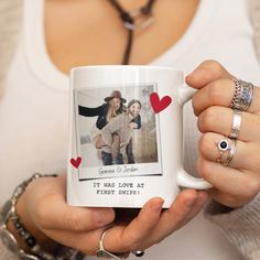 a woman holding a coffee mug with two photos on the front and back of it