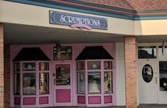 the front entrance to scrumptions is painted pink and purple