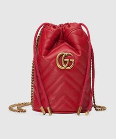 Description For the Pre-Fall 2018, the GG Marmont backpack is retooled in a small, softly structured variation in chevron matelassé leather, treated for a vintage effect. The Double G hardware, inspired by an archival design, enriches the flap, which hides an internal drawstring. Size: 7.5 x 4 x 7.5 inches / 19cm x 10cm x 19cm 100% genuine materials, matching the quality of the Gucci product (imported from Europe); Hibiscus Red matelassé chevron leather Antique gold-toned hardware Double G Adjustable chain and leather straps Interior open pocket Magnet closure Microfiber lining with a suede-like finish Comes with dust bag, ation cards, and pamphlets 1:1 mirror image qualityDelivery 5-8 or 10-15 working days Please note that during high season and Sale period, delivery times may be affected Gg Marmont Mini Bucket Bag, Gucci Bucket Bag, Gucci Gg Marmont Matelasse, Gucci Gg Marmont Mini, Gg Marmont Mini, Gucci Mini, Mini Bucket Bag, Mini Bucket Bags, Mini Bucket