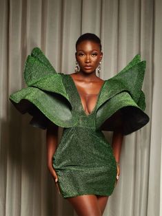 This beautiful custom-made mini dress is a must-have for any evening occasion. It is designed with two layered-detail and deep v-cut. Green Dress Photoshoot Ideas, Beauty Photoshoot Ideas, Green Formal Dress, Mobile Display, Beautiful Maxi Dresses, Layered Dress, فستان سهرة, Glitter Dress, The Grace