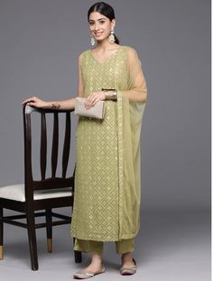 *Women Ethnic Motifs Embroidered Regular Sequinned Kurta with Trousers & With Dupatta Pakistani Salwar Kameez / Indian Wedding Dress / Plus Size Cotton Dress Traditional Indian Wear / Salwar Kameez Dupatta / Kurti Palazzo Set / Hand Embroidery kurta Olive green embroidered Kurta with Trousers with dupatta *Kurta design:-  *  Ethnic motifs embroidered   *  Straight shape   *  Regular style   *  V-neck, sleeveless no sleeves   *  2 pockets sequinned detail   *  Calf length length with straight hem Elegant Sleeveless Georgette Traditional Wear, Sleeveless Salwar Kameez With Resham Embroidery, Sleeveless Georgette Traditional Wear For Navratri, Sleeveless Georgette Traditional Wear For Eid, Sleeveless Salwar Kameez For Party, Sleeveless Kurta For Wedding And Navratri, Anarkali Sleeveless Salwar Kameez With Chikankari Embroidery, Anarkali Salwar Kameez With Chikankari Embroidery, Sleeveless Georgette Salwar Kameez For Navratri