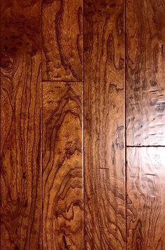 closeup of the top part of a hardwood floor with wood grains on it