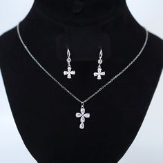 New to our Millennium collection, These beautiful romantic Clover and Cross Drop bridal earrings and necklace set are made of very fine quality of Swarovski crystals/ Cz diamonds, stainless steel and plated with platinum and gold for your special day! Even we have hard time taking pictures because of their shine 😄 so we want to shine our brides on their special days. Simulated diamonds are also known as diamond simulants and include things like cubic zirconia (CZ), moissanite, and YAG. They can Bridal Earrings Drop, Necklace Bridal, Physical Properties, Earrings And Necklace, Cz Necklace, Jewelry Bridal, Diamond Simulant, Necklace Statement, Bride Jewellery