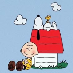 a charlie brown cartoon sitting on top of a roof with his doghouse in the background