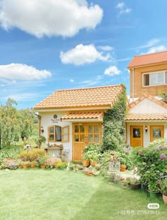 a house with lots of plants and flowers in the front yard