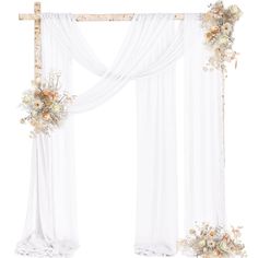 a white curtain with flowers hanging from it