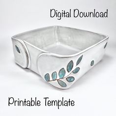 a silver bracelet with leaves on it and the words digital printable template in front