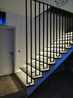 the stairs are lit up with white lights