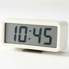 an alarm clock displaying the time on white background with clipping area for text or image