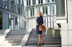 The week starts off busy for Sandra. A short trip to see a client followed by a formal dinner, a long day. However, Sandra’s outfit is perfect: The gorgeous dark blue dress with matching jacket by Hugo Boss, with dark blue pumps by Pura López, topped with the golden Hermes bag, almost impossible to be more stylish. To all of you a happy week! Dark Blue Pumps, Happy Week, Dark Blue Dress, Blue Pumps, Formal Dinner, Short Trip, Working Woman