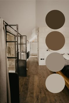 an image of a bedroom with wood floors and white walls in the background, along with circles on the wall