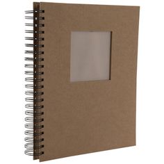 a brown notebook with an empty page in the middle