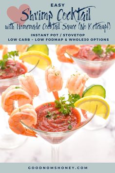 shrimp cocktail served in martini glasses with lemon wedges and garnish