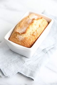 a loaf of bread sitting on top of a white plate