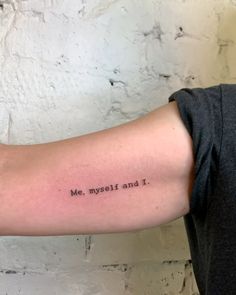 a woman's arm with the words me, mystify and i tattooed on it