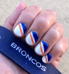 Photo by Kari on June 25, 2021. May be an image of text that says 'BRONCOS' Sports Themed Nails, Game Day Nails, Broncos Nails, Themed Nail Art, Nail Design, Game Day, Nail Designs, Nail Art, Nails