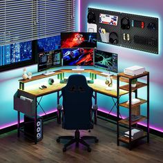 a computer desk with multiple monitors on it