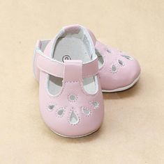 Beautiful buttery soft leather pre-walker t-bar mary jane shoes, made with velcro fastening. These shoes have a flexible suede leather outer sole -- and the prettiest tear drop perforated cut out pattern on the front for the tiniest toes. Infant sizes 0-5. Size Chart (in-sock length, measured from inside): Size 0 1 2 3 4 5 In. 3.74 4.09 4.41 4.76 5.08 5.39 Mary Jane Shoe, Angel Baby, Jane Shoes, Baby Angel, Mary Jane Shoes, T Strap, Tear Drop, Mary Janes, Suede Leather