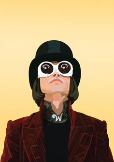 a man in a black hat and red jacket with goggles on his eyes looking up at the sky