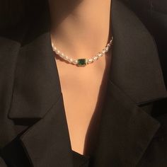 Handcrafted with care, this necklace features lustrous baroque pearls and vibrant emerald green gemstone, elegantly arranged to create a stunning contrast. The rich green hues of the emeralds complement the shimmering pearls, making this necklace a timeless and versatile accessory. Features: Handcrafted Elegant and versatile design Perfect for both casual and formal occasions Makes a thoughtful gift for someone special Specifications: Material: Emerald green zircon, cultured baroque pearls Lengt Pearl Emerald Necklace, Elegant Green Pearl Drop Necklaces, Elegant Green Necklaces With Pearl Drop, Green Pearl Necklaces With Pearl Pendant, Green Pearl Pendant Necklace For Formal Occasions, Green Beaded Necklace With Pearl Drop For Gift, Formal Green Necklace With Pearl Pendant, Formal Green Pearl Necklaces, Green Pearl Drop Beaded Necklaces