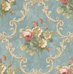 a blue wallpaper with pink and white flowers on it's border, in an ornate pattern