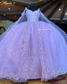 Light Purple And Silver Quinceanera Dresses, Sweet 15 Purple Dress, Purple Sparkly Quince Dress, Butterfly Purple Quinceanera Dresses, Light Purple Quinceanera Theme Dresses, Purple Quince Dress With Cape, Light Purple Princess Dress, Quinceanera Dresses With Lights, Lavender Quinceanera Dresses Long Sleeve