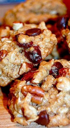 close up view of cookies with cherries and nuts