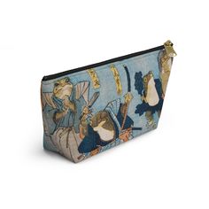 a small blue pouch with an image of cats and mice on the front, sitting next to each other