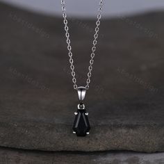 This is a Coffin cut black onyx necklace 925 sterling silver dainty black onyx pendant black gemstone jewelry minimalist anniversary gift for her. For those who are looking for black onyx jewelry which is handcrafted in details, this unique black onyx necklace would be a perfect choice for you. Whether it be a Birthday gift for her, an anniversary gift her, or a celebration of yourself, this black onyx jewelry is the perfect gift from the heart. Details: *6x9mm coffin cut black onyx Chain length Black Onyx Pendant, Black Onyx Jewelry, Onyx Pendant, Black Onyx Necklace, Jewelry Minimalist, Onyx Jewelry, Gem Necklace, Onyx Necklace, Anniversary Gift For Her