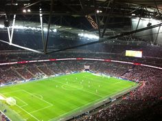 a soccer stadium filled with lots of people