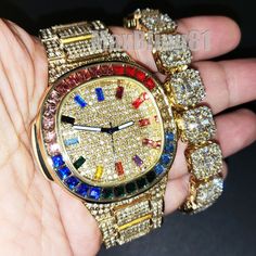 HIP HOP GOLD PT MULTI COLOR STONE WATCH & ICY BAGUETTE STONE CHAIN BRACELET SET  USA SELER Bracelet: Hip Hop celebrity CZ Baguette Link Chian bracelet 14K gold plating for a premium quality finish that will turn heads. 12mm width and 8.5" Length. Luxury clasp to lock your bracelet easily and securely.  Celebrity Style  High Quality & polished. Top Quality CZ stones Watch: Brand : MaxBling81 100% brand new Finish: 14K Gold plated Case Size : 45mm X 45mm Case Back: Stainless Steel Lab Simulated Diamonds on the Bezel & Band Movement: Quartz Japan Battery included. Lock: Fold Over (Wallet Clasp) Gender: Men's Removable Links (Adjustable) Luxury style Retail Price : $169 Payments: US Customers: Paypal accepted International Customers: Paypal accepted Shipping: We combine shipping! We ship via U Bezel Band, Ice Stone, Color Stone, Luxury Style, Diamond Watch, Cz Stone, Fold Over, Gold Plating, Bracelet Set