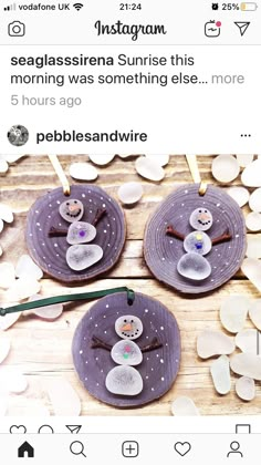 two snowmen are sitting on purple plates