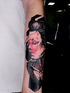 a person with a tattoo on their arm