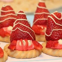 strawberry gnomes made out of cookies on a plate