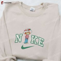 Introducing the Nike x Strawberry Shortcake Cartoon Embroidered Sweatshirt, a delightful collaboration that brings together the iconic Nike brand and the beloved Strawberry Shortcake cartoon. This sweatshirt is not only stylish but also celebrates nostalgia and childhood memories. Featuring intricate embroidery of Strawberry Shortcake and her friends, this sweatshirt is a true collector’s item. The high-quality materials ensure durability and comfort, making it perfect for everyday wear or Nike Embroidery Christmas Sweatshirt, Nike Christmas Clothes, Christmas Crewneck Sweatshirt Nike, Christmas Embroidery Sweatshirts Nike, Nike Christmas Sweatshirts, Christmas Crewneck Nike, Nike Christmas, Nike Cartoon, Movie Christmas