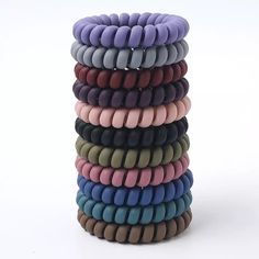 Non-marking Spiral/Coil Hair Ties Matte Multi-color pack (11 big hair ties in a pack) Material: Plastic Which hair type is it good for?✔ Straight✔ Wavy✔ Curly✔ Coiled✔ Tightly Coiled Suggested Usage: -Wrap around your hair two to three times, as desired.-For big pineapples and voluminous pineapples, only wrap once. 𝐂𝐮𝐫𝐥 ���𝐂𝐨𝐢𝐥𝐬 help to prevent tangling and hair breakage that many hair ties cause. The spiral, telephone cord design spreads the pressure of the hair elastic out over a greater Coil Hair Ties, Matte Hair, Hair Coils, Hair Supplies, Hair Accessories Collection, Spiral Shape, Elastic Hair Ties, Spiral Design, Hair Rings