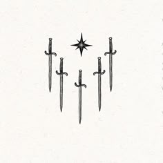 four swords are lined up in the shape of a star