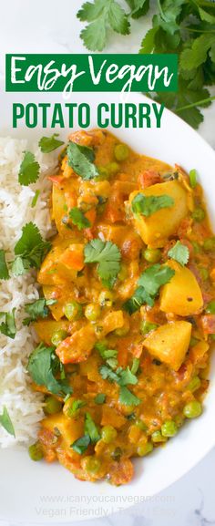 a white bowl filled with potato curry next to rice and cilantro garnish