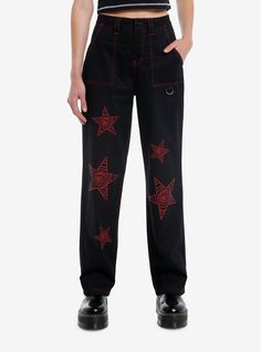 We're seeing stars! Get an edgy street look with these black skater pants! They feature red contrast stitching throughout  plus red spiral star designs down the legs. Comes with front and back pockets  plus D-ring detailing.Please note: Style is fitted with no stretch; size up for a looser fit.100% cottonWash cold; dry lowNon-stretch materialRise 13''Inseam: 32''ImportedListed in junior sizesModel is 5'10''Model wears size 3 Hot Topic Pants, Black Wide Leg Pants With Star Print, Black Straight Leg Pants With Star Print, Black Star Print Bottoms For Streetwear, Trendy Black Star Print Pants, Trendy Black Pants With Star Print, Edgy Red Straight Leg Bottoms, Swirl Star, Spiral Star