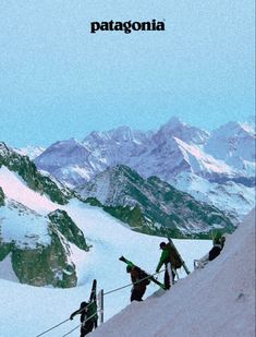 people climbing up the side of a snow covered mountain with skis on their feet