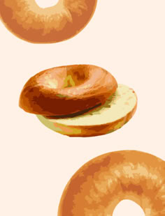 two donuts are flying in the air and one is on top of another doughnut