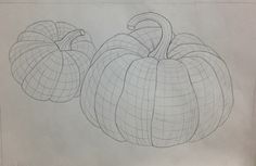 a drawing of two pumpkins sitting next to each other on top of a piece of paper