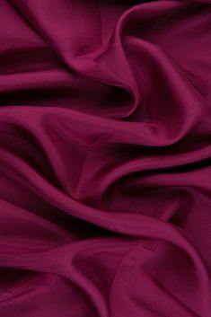 Magenta Purple Habotai Silk Fabric is a light, delicate silk fabric with a smooth finish and flowing drape. Habotai is most often used in eveningwear, home decor, and sportswear. The word "habotai" derives from the Japanese word, which literally means "feather-two layer". Habotai is also sometimes referred to as "China Silk". Our habotai is 100% silk and woven in South Korea. The fabric is lightweight and adaptable and is most often used as a lining fabric - the silk fibers give this fabric great breathability and absorbency which makes it perfect for lining suits, jackets, and other garments. Fabric Weight: 8 MM The fabric is sold by the Yard, and measures 44 inches in width. Vintage Fashion 1950s, Beautiful Braided Hair, Japanese Word, Habotai Silk, Dark Magenta, Magenta Purple, Japanese Words, Organza Fabric, Color Analysis