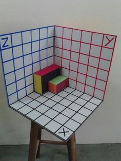 a table that has some sort of cube on it