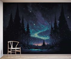 a chair sitting in front of a wall mural with an aurora bore and stars on it