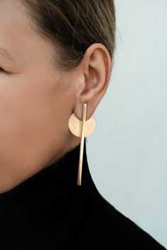 "Gold ear jacket earrings, Extra long earrings, Front back earrings, Double sided earrings gold statement earrings, Straight line earrings Earrings are available both in brass and silver, or both (brass bars + silver circles). These modular earrings with sterling silver posts and backs are polished to give them a soft matte texture. Each earring consists of 2 parts that can be detached from each other and worn in various ways - the disc can be worn in front, behind the ear as ear jacket or compl Modern Silver Ear Climbers, Line Earrings, Extra Long Earrings, Gold Ear Jacket, Jacket Earrings, Double Earrings, Double Sided Earrings, Large Statement Earrings, Earrings Double