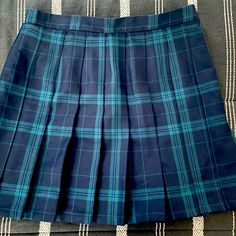 Green And Blue Pleated Mini Skirt. New With Tags. Smoke Free Home Blue Pleated Skirt For School, Blue School Uniform Pleated Skirt, Blue Pleated School Uniform Skirt, Blue Casual Pleated Skirt For School, Blue Short Tennis Skirt For School, Casual Blue Pleated Skirt For School, Blue Tennis Skirt For School, Blue School Tennis Skirt, Blue Short-length Tennis Skirt