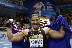 a female athlete is celebrating her victory at the olympics