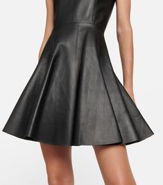 Leather minidress in black - Alaia | Mytheresa Sleek Fitted Leather Mini Dress, Luxury Fitted A-line Mini Dress, Elegant Leather Mini Dress, Leather Mini Dress For Party, Leather Knee-length Mini Dress For Party, Mini Length Leather Dress, Knee-length Leather Mini Dress For Formal Occasions, Elegant Mini Leather Dress, Formal Knee-length Leather Mini Dress